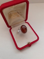 Marked silver ring set with an amber colored stone