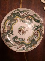 Oriental porcelain, small plate / cup bottom with dragon (Chinese)