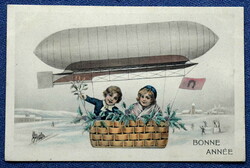 Antik grafikus Újévi üdvözlő  képeslap gyerekek léghajón téli táj hóember szerencsepatkó