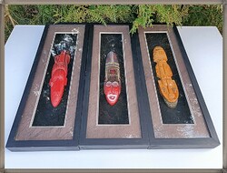 African wall decoration masks, in a wooden frame with glass plates