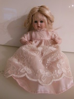 Doll - porcelain - sitting - 16 x 14 x 14 cm - sweet - charming face - German - new