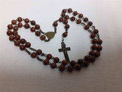 Rosary prayer chain made of old rosewood beads in good condition with a sophisticated crucifix on it