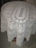 Beautiful oval lace tablecloth with hearts