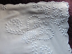 Beautiful snow-white hand-embroidered tablecloth