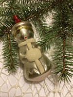 Old glass girl in winter clothes Christmas tree decoration
