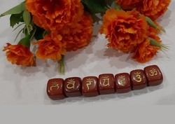 Sanskrit chakra symbols are real term. Engraved in red jasper in a bag, topaaa