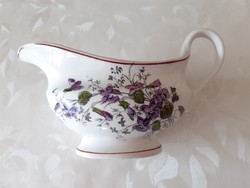 Antique porcelain pouring old violet patterned sauce offering folk sauce