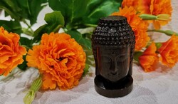 A beautiful meditating Shakyamuni Buddha head on a pedestal, real, product. Chinese redwood