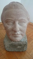 Female head - limestone sculpture