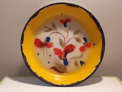 Old Budafok enamel bowl on vintage floral enamel plate