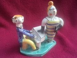 Ceramic figurine of Éva Kumpost, aria with piano accompaniment