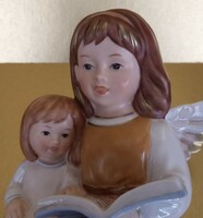 Goebel angel bed with little girl (12.5 cm) --- can be placed on the edge of the shelf