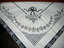 Black hand-embroidered tablecloth