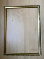 Thin gilded wooden picture frame