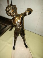 Bronze statue of a little boy on a marble plinth