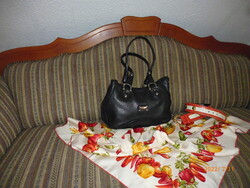 Coccinelle ..Italian genuine leather bag ..Made of cowhide..