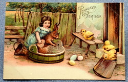 Antique embossed Easter greeting litho postcard little girl bathing a bunny chicks egg