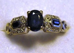 Vintage 14 carat white gold art deco style blue sapphire and diamond ring.