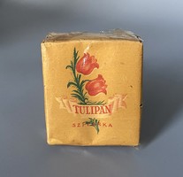 Old unopened pack of cigarettes with tulip cigars
