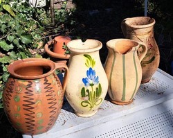 4 damaged ethnographic jugs