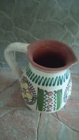 White glazed ceramic jug with folk pattern for sale