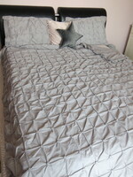 Gray bed linen or bedspread