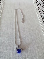 New silver plated necklace with dog pendant -- rotating blue cat's eye stone