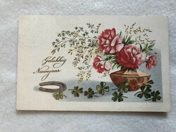 Old gilded New Year postcard with flowers, clover, horseshoe