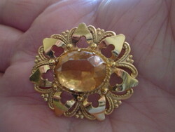 A citrine dipped in real gold, i.e. gilded? Stone original antique brooch with a beautiful large stone