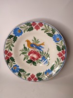 ﻿An old miskolcz-marked hard terracotta painted folk wall plate with a bird