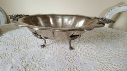 Large, silver-plated fruit basket on legs, offering