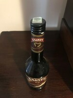 Saints chocolate liqueur glass bottle. Crem liquer. In undamaged condition. Size: 26 cm high