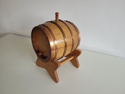 Retro old ornament on wooden wine barrel barrel stand
