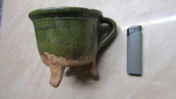 Ceramic mug with legs
