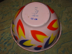 Enamelled enamel bowl with colorful art deco pattern on pink background