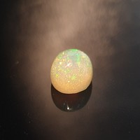 Breathtaking opal 3.17 Carat self-cut.