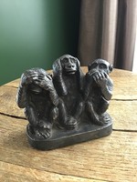 Old Israeli silver statue of three monkeys. He can't see, he can't hear, he can't speak.