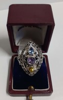 Old, marked silver ring in good condition, set with a polished set aquamarine amethyst citrine stone