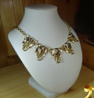 Light gold colored cute elephant necklaces with small crystal stones