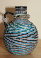 Bottle with blue and white fuse