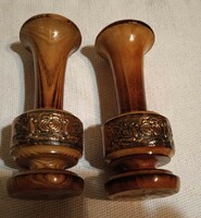 Set of two wooden candle holders in folk style