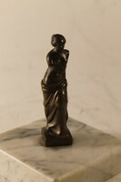 Antique bronze statue on a marble base 893