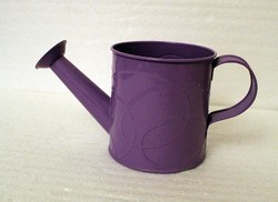 Tiny metal purple watering can