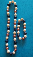 Beautiful white and rose colored shell pearl and lapis lazuli jewelry set, necklace and bracelet with magnetic closure