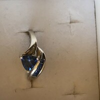 White gold ring with a tiny brille and synthetic sapphire