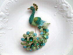 Large peacock brooch with rhinestones