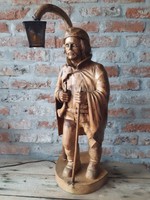 Night watchman wooden statue