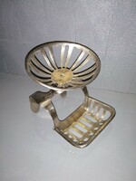 Antique chrome-plated brass soap dish - on the edge of the bathtub