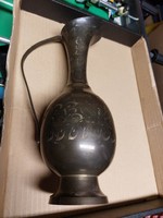 A metal jug for sale