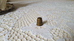 Old brass thimble